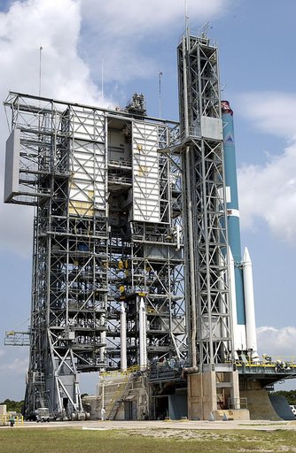 KENNEDY SPACE CENTER, FLA. - At right is the Delta II rocket on Launch Complex 17-A, Cape Canaveral Air Force Station, that will launch Mars Exploration Rover 2 (MER-2) on June 5.  In the center are three more solid rocket boosters that will be added to the Delta, which will carry nine in all.  NASA