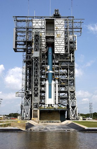 KENNEDY SPACE CENTER, FLA. -  The Delta II rocket on Launch Complex 17-A, Cape Canaveral Air Force Station, is having solid rocket boosters (SRBs) installed that will help launch Mars Exploration Rover 2 (MER-2) on June 5.  In the center are three more solid rocket boosters that will be added to the