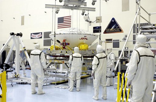 KENNEDY SPACE CENTER, FLA. -  In the Payload Hazardous Servicing Facility, an overhead crane is lifting the Mars Exploration Rover 2 (MER-2) to move it to a spin table.  NASA’s twin Mars Exploration Rovers are designed to study the history of water on Mars. These robotic geologists are equipped with