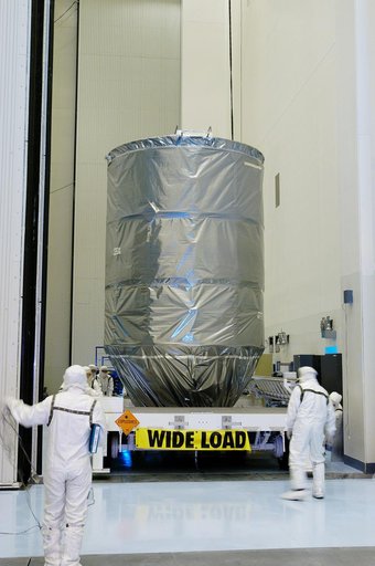 KENNEDY SPACE CENTER, FLA. -  The Delta II rocket’s third stage arrives at the Payload Hazardous Servicing Facility.  It will be mated with the Mars Exploration Rover 2 (MER-2) and then installed into the transportation canister for transfer to the launch pad.  NASA's twin Mars Exploration Rovers ar