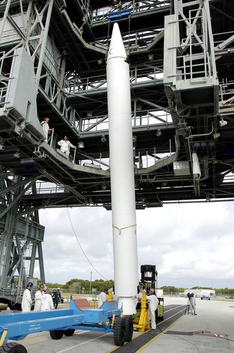 KENNEDY SPACE CENTER, FLA. - On Launch Complex 17-B, Cape Canaveral Air Force Station, a solid rocket booster is lifted to vertical.  It will be mated to the Delta II rocket for the Mars Exploration Rover 1 (MER-1) launch June 25.  NASA’s twin Mars Exploration Rovers are designed to study the histor