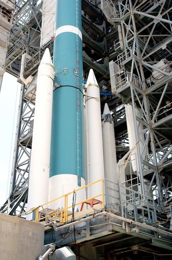 KENNEDY SPACE CENTER, FLA. - On the launch tower of Launch Complex 17-B, Cape Canaveral Air Force Station, solid rocket boosters are mated to the Delta II rocket for the Mars Exploration Rover 1 (MER-1) launch June 25.  NASA’s twin Mars Exploration Rovers are designed to study the history of water o