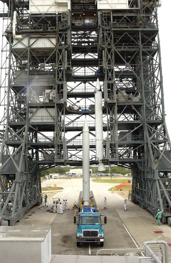 KENNEDY SPACE CENTER, FLA. -  Another solid rocket booster is lifted up the launch tower on Launch Complex 17-B, Cape Canaveral Air Force Station.  It will be mated to the Delta II rocket for the Mars Exploration Rover 1 (MER-1) launch June 25.  NASA’s twin Mars Exploration Rovers are designed to st