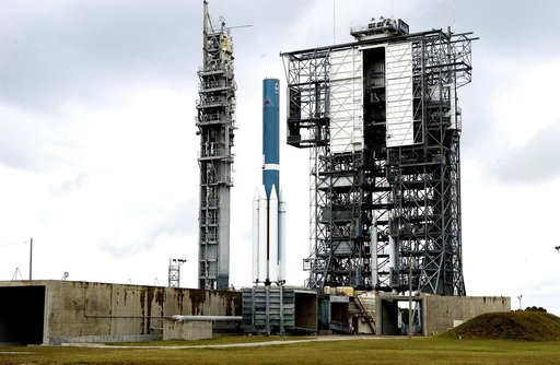 KENNEDY SPACE CENTER, FLA. -  Solid rocket boosters are positioned around the base of a Delta II rocket for the Mars Exploration Rover 1 (MER-1) launch on June 25 at Launch Complex 17-B, Cape Canaveral Air Force Station.  NASA’s twin Mars Exploration Rovers are designed to study the history of water