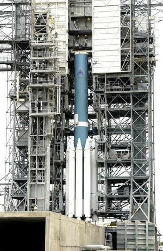 KENNEDY SPACE CENTER, FLA. -  Solid rocket boosters are attached to the base of a Delta II rocket for the Mars Exploration Rover 1 (MER-1) launch on June 25 at Launch Complex 17-B, Cape Canaveral Air Force Station.  NASA’s twin Mars Exploration Rovers are designed to study the history of water on Ma