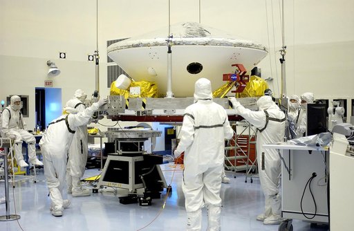 KENNEDY SPACE CENTER, FLA. -  In the Payload Hazardous Servicing Facility, workers prepare to mate the Mars Exploration Rover-2 (MER-2) to the third stage of a Delta II rocket for launch on June 5.  NASA’s twin Mars Exploration Rovers are designed to study the history of water on Mars. These robotic