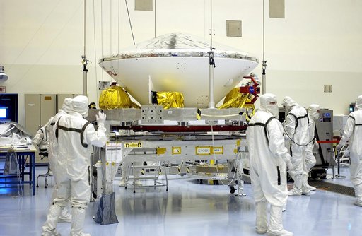 KENNEDY SPACE CENTER, FLA. -  In the Payload Hazardous Servicing Facility, workers prepare to mate the Mars Exploration Rover-2 (MER-2) to the third stage of a Delta II rocket for launch on June 5.  NASA’s twin Mars Exploration Rovers are designed to study the history of water on Mars. These robotic