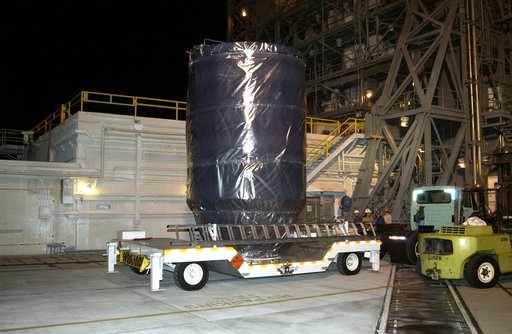 KENNEDY SPACE CENTER, FLA. - The Mars Exploration Rover 2 (MER-2), inside the transport canister, has arrived at Launch Pad 17-A, Cape Canaveral Air Force Station, where it will be mated to the Delta II rocket for launch.  MER-2 is one of NASA's twin Mars Exploration Rovers designed to study the his