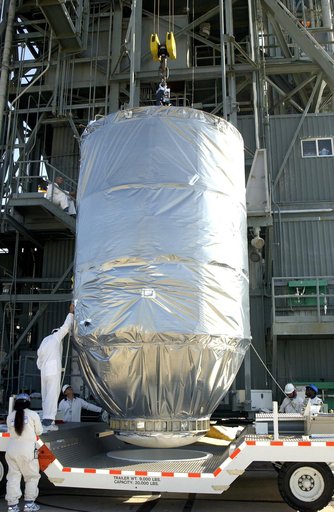 KENNEDY SPACE CENTER, FLA. - On Launch Pad 17-A, Cape Canaveral Air Force Station, the Mars Exploration Rover 2 (MER-2), inside the transport canister, is ready to be lifted into the launch tower where it will be mated to the Delta II rocket for launch.  MER-2 is one of NASA's twin Mars Exploration 