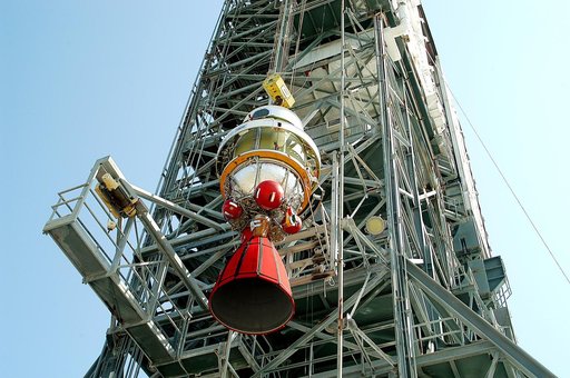 KENNEDY SPACE CENTER, FLA. - The second stage of a Delta II rocket is lifted up the launch tower on Pad 17-B, Cape Canaveral Air Force Station.  It will be mated to the Delta first stage already at the pad in preparation for the launch of the Mars Exploration Rover-1 (MER-B) on June 25.  NASA’s twin