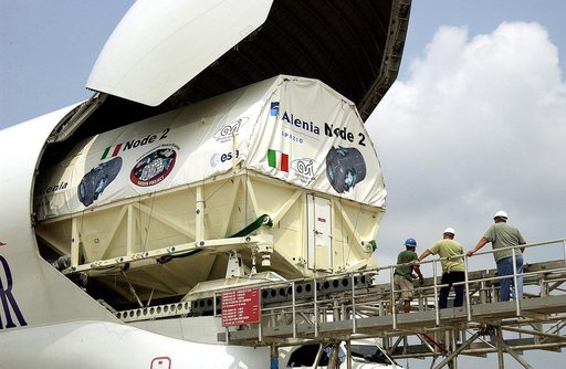KENNEDY SPACE CENTER, FLA. - The Italian-built module, U.S. Node 2, for the International Space Station is offloaded from a Beluga aircraft at the Shuttle Landing Facility. The second of three Station connecting modules, Node 2 attaches to the end of the U.S. Lab and provides attach locations for th
