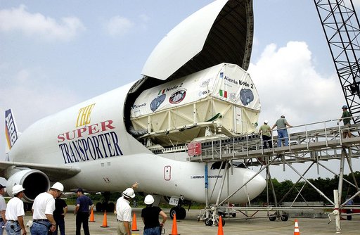 KENNEDY SPACE CENTER, FLA. - The Italian-built module, U.S. Node 2, for the International Space Station is offloaded from a Beluga aircraft at the Shuttle Landing Facility. The second of three Station connecting modules, Node 2 attaches to the end of the U.S. Lab and provides attach locations for th
