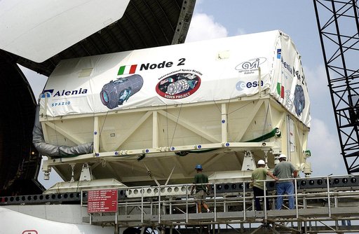 KENNEDY SPACE CENTER, FLA. - The Italian-built module, U.S. Node 2, for the International Space Station is offloaded from a Beluga aircraft at the Shuttle Landing Facility. The second of three Station connecting modules, Node 2 attaches to the end of the U.S. Lab and provides attach locations for th