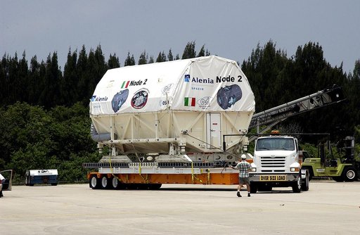 KENNEDY SPACE CENTER, FLA. -  The Italian-built module, U.S. Node 2, begins its transfer from  the Shuttle Landing Facility to the Space Station Processing Facility.  The second of three connecting modules on the International Space Station, Node 2 attaches to the end of the U.S. Lab and provides at