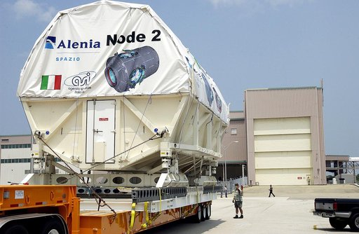 KENNEDY SPACE CENTER, FLA. -  The Italian-built module, U.S. Node 2, nears the Space Station Processing Facility after its move from the Shuttle Landing Facility. The second of three connecting modules on the International Space Station, Node 2 attaches to the end of the U.S. Lab and provides attach