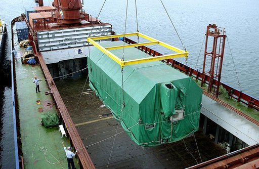 KENNEDY SPACE CENTER, FLA. - At Port Canaveral, the Pressurized Module of the Japanese Experiment Module (JEM) is lifted out of the ship’s cargo hold.  The container transport ship carrying JEM departed May 2 from Yokohama Harbor in Japan for the voyage to the United States. The National Space Devel