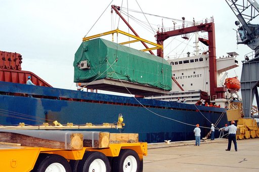 KENNEDY SPACE CENTER, FLA. - At Port Canaveral, the Pressurized Module of the Japanese Experiment Module (JEM) is swung away from the ship. The container transport ship carrying JEM departed May 2 from Yokohama Harbor in Japan for the voyage to the United States. The National Space Development Agenc