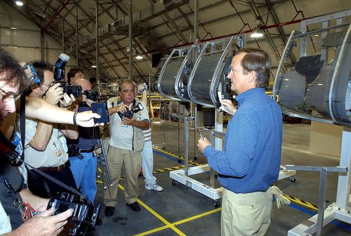 KENNEDY SPACE CENTER, FLA. -  In the Columbia Debris Hangar,  Shuttle Launch Director Mike Leinbach  (right) talks to the media about activities that have taken place since the Columbia accident on Feb. 1, 2003.  STS-107 debris recovery and reconstruction operations are winding down.  To date, nearl