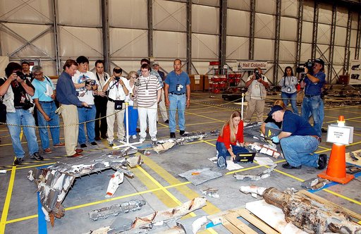 KENNEDY SPACE CENTER, FLA. - The media get a guided tour of the Columbia Debris Hangar.  Shuttle Launch Director Mike Leinbach discussed activities that have taken place since the Columbia accident on Feb. 1, 2003.  STS-107 debris recovery and reconstruction operations are winding down.  To date, ne