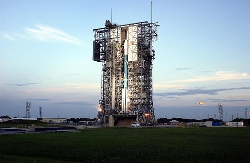 KENNEDY SPACE CENTER, FLA. -  The Mobile Service Tower is rolled back at Launch Complex 17A to reveal a Delta II rocket ready to launch the Mars Exploration Rover-A mission.  NASA's twin Mars Exploration Rovers are designed to study the history of water on Mars. These robotic geologists are equipped