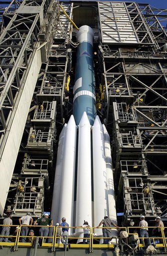 KENNEDY SPACE CENTER, FLA. -  The Mobile Service Tower is rolled back at Launch Complex 17A to reveal a Delta II rocket ready to launch the Mars Exploration Rover-A mission.  NASA's twin Mars Exploration Rovers are designed to study the history of water on Mars. These robotic geologists are equipped