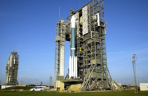 KENNEDY SPACE CENTER, FLA. -  The Mobile Service Tower is rolled back at Launch Complex 17A to reveal a Delta II rocket ready to launch the Mars Exploration Rover-A mission.  NASA's twin Mars Exploration Rovers are designed to study the history of water on Mars. These robotic geologists are equipped