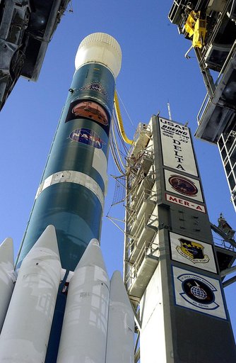 KENNEDY SPACE CENTER, FLA. -  The Mobile Service Tower is rolled back at Launch Complex 17A to reveal a Delta II rocket ready to launch the Mars Exploration Rover-A mission.  NASA's twin Mars Exploration Rovers are designed to study the history of water on Mars. These robotic geologists are equipped