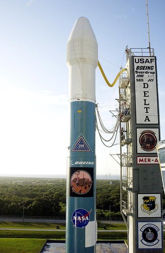 KENNEDY SPACE CENTER, FLA. -  The Mobile Service Tower is rolled back at Launch Complex 17A to reveal a Delta II rocket ready to launch the Mars Exploration Rover-A mission.  NASA's twin Mars Exploration Rovers are designed to study the history of water on Mars. These robotic geologists are equipped