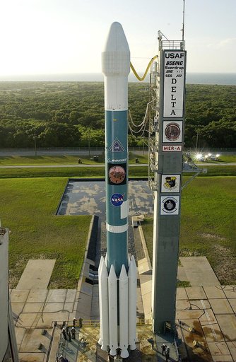 KENNEDY SPACE CENTER, FLA. -  The Mobile Service Tower is rolled back at Launch Complex 17A to reveal a Delta II rocket ready to launch the Mars Exploration Rover-A mission.  NASA's twin Mars Exploration Rovers are designed to study the history of water on Mars. These robotic geologists are equipped
