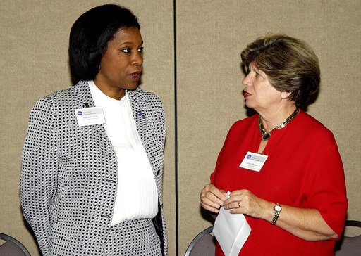 KENNEDY SPACE CENTER, FLA. -    KSC Director of External Relations and Business Development JoAnn Morgan talks with Dr. Adena Williams Loston at a reception and dinner at the Debus Conference Center June 6.  Loston is NASA’s new associate administrator of Education and the reception was in her honor