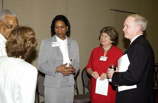 KENNEDY SPACE CENTER, FLA. -    Dr. Adena Williams Loston  (center) talks to attendees (left) of a reception and dinner in her honor at the Debus Conference Center June 6.  With her are Director of External Relations and Business Development JoAnn Morgan and Center Director Roy Bridges Jr.  Loston i