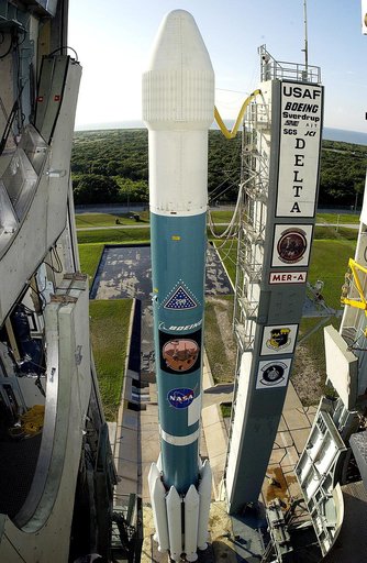 KENNEDY SPACE CENTER, FLA. -    The launch tower on Launch Complex 17-A, Cape Canaveral Air Force Station, clears the Boeing Delta II rocket and its Mars Exploration Rover (MER-A) payload in preparation for a second attempt at launch.  The first attempt on June 8, 2003, was scrubbed due to bad weath