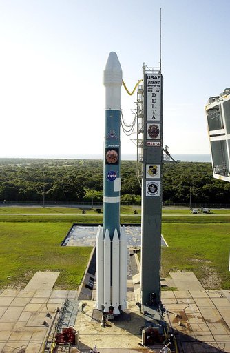 KENNEDY SPACE CENTER, FLA. -    On Launch Complex 17-A, Cape Canaveral Air Force Station, the Boeing Delta II rocket and its Mars Exploration Rover (MER-A) payload are in the clear after tower rollback in preparation for a second attempt at launch.  The first attempt on June 8, 2003, was scrubbed du
