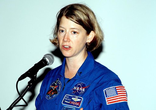 KENNEDY SPACE CENTER, FLA. -    At the Florida Commission on the Status of Women held June 7 at the Debus Conference Facility, astronaut Pamela Melroy speaks to attendees.  Melroy has served as pilot on two Shuttle flights (STS-92 in 2000 and STS-112 in 2002), and has logged more than 562 hours in s