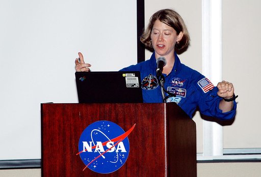 KENNEDY SPACE CENTER, FLA. -    At the Florida Commission on the Status of Women held June 7 at the Debus Conference Facility, astronaut Pamela Melroy speaks to attendees.  Melroy has served as pilot on two Shuttle flights (STS-92 in 2000 and STS-112 in 2002), and has logged more than 562 hours in s