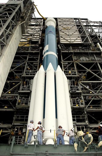 KENNEDY SPACE CENTER, FLA. -   On Launch Complex 17-A, Cape Canaveral Air Force Station, the launch tower begins to roll back from the Boeing Delta II rocket and its Mars Exploration Rover (MER-A) payload in preparation for another launch attempt.  The first two attempts were postponed due to weathe