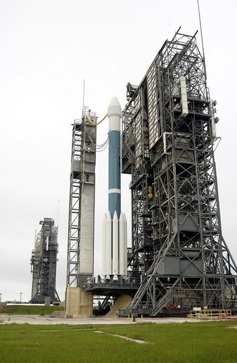 KENNEDY SPACE CENTER, FLA. -   On Launch Complex 17-A, Cape Canaveral Air Force Station, the launch tower rolls back from the Boeing Delta II rocket and its Mars Exploration Rover (MER-A) payload in preparation for another launch attempt.  The first two attempts, June 8 and June 9, were postponed du