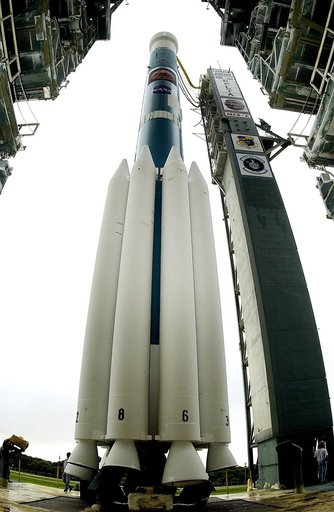 KENNEDY SPACE CENTER, FLA. -   On Launch Complex 17-A, Cape Canaveral Air Force Station, the Boeing Delta II rocket and its Mars Exploration Rover (MER-A) payload are viewed as the launch tower overhead rolls back.   This will be the third launch attempt in as many days after weather concerns postpo