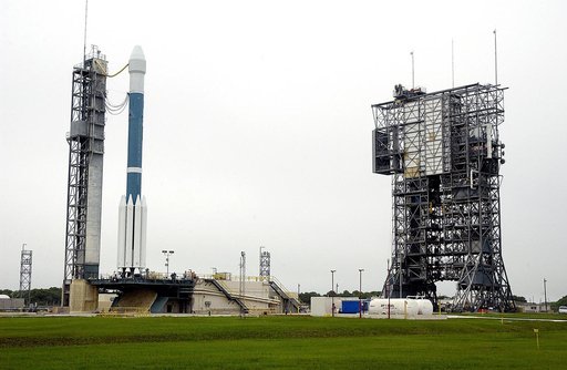 KENNEDY SPACE CENTER, FLA. -  On Launch Complex 17-A, Cape Canaveral Air Force Station, the Boeing Delta II rocket and its Mars Exploration Rover (MER-A) payload are free of the tower (right) and ready for launch.  This will be the third launch attempt in as many days after weather concerns postpone