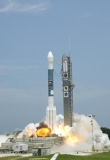KENNEDY SPACE CENTER, FLA. -  The Delta II rocket with its Mars Exploration Rover (MER-A) payload leaps off the launch pad into the blue sky to begin its journey to Mars.  Liftoff occurred on time at 1:58 p.m. EDT from Launch Complex 17-A, Cape Canaveral Air Force Station.  MER-A, known as "Spirit,"