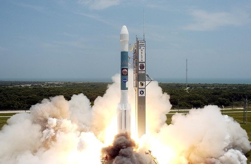 KENNEDY SPACE CENTER, FLA. -   With a glimpse of the Atlantic Ocean over the horizon, the Delta II rocket with its Mars Exploration Rover (MER-A) payload leaps off the launch pad into the blue sky to begin its journey to Mars.  Liftoff occurred on time at 1:58 p.m. EDT from Launch Complex 17-A, Cape