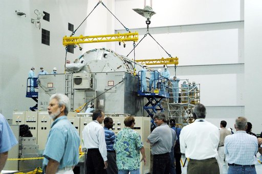 KENNEDY SPACE CENTER, FLA. -  In the Space Station Processing Facility, the Japanese Experiment Module (JEM) pressure module is ready to be lifted out of the shipping canister and transferred to a work stand.  A research laboratory, the pressurized module is the first element of the JEM, named "Kibo