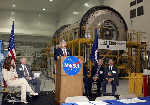 KENNEDY SPACE CENTER, FLA. -   NASA's Michael C. Kostelnik, deputy associate administrator for International Space Station and Shuttle Programs, speaks to guests and the media gathered in the Space Station Processing Facility for a ceremony to highlight the arrival of two major components of the Int