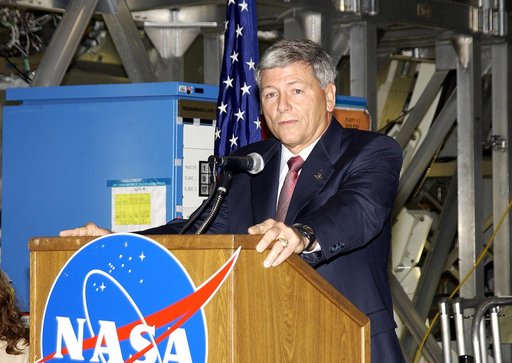 KENNEDY SPACE CENTER, FLA. -   NASA’s Michael C. Kostelnik, deputy associate administrator for International Space Station and Shuttle Programs, speaks to guests and the media gathered in the Space Station Processing Facility for a ceremony to highlight the arrival of two major components of the Int
