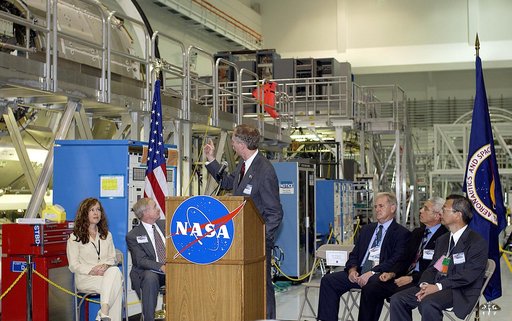 KENNEDY SPACE CENTER, FLA. -   At a ceremony highlighting the arrival of two major components of the International Space Station, William Gerstenmaier, International Space Station Program manager, points to one of the components as he speaks to guests and the media gathered in the Space Station Proc