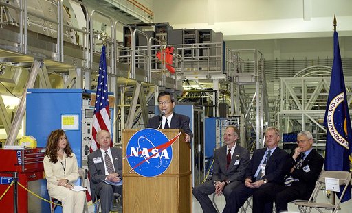 KENNEDY SPACE CENTER, FLA. -  Kuniaki Shiraki, JEM Project manager, National Aerospace and Development Agency of Japan,  speaks to guests and the media gathered in the Space Station Processing Facility at a ceremony highlighting the arrival of two major components of the International Space Station.