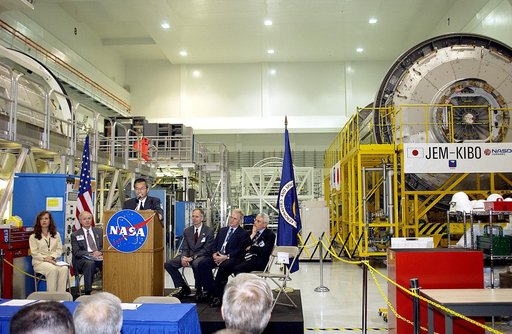 KENNEDY SPACE CENTER, FLA. - Kuniaki Shiraki, JEM Project manager, National Aerospace and Development Agency of Japan,  speaks to guests and the media gathered in the Space Station Processing Facility at a ceremony highlighting the arrival of two major components of the International Space Station. 