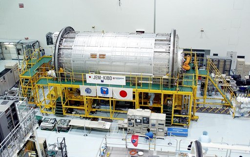KENNEDY SPACE CENTER, FLA. -  International Space Station elements being processed for launch on upcoming Space Shuttle flights, including the Japanese Experiment Module (JEM) pressurized module, line the walls of the high bay in the Space Station Processing Facility. The JEM pressurized module, nam