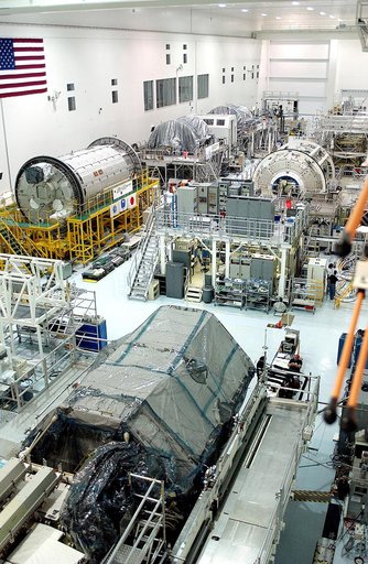 KENNEDY SPACE CENTER, FLA. -  International Space Station elements being processed for launch on upcoming Space Shuttle flights, including the Japanese Experiment Module (JEM) pressurized module (Kibo or Hope) and the U.S. Node 2, line the walls of the high bay in the Space Station Processing Facili
