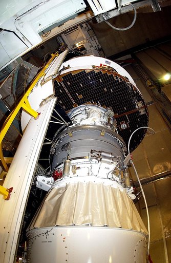 KENNEDY SPACE CENTER, FLA. - At Launch Complex 17-B, Cape Canaveral Air Force Station, the spacecraft fairing is being installed around the Mars Exploration Rover-1 (MER-B). The second of twin rovers being sent to Mars, it is equipped with a robotic arm, a drilling tool, three spectrometers, and fou